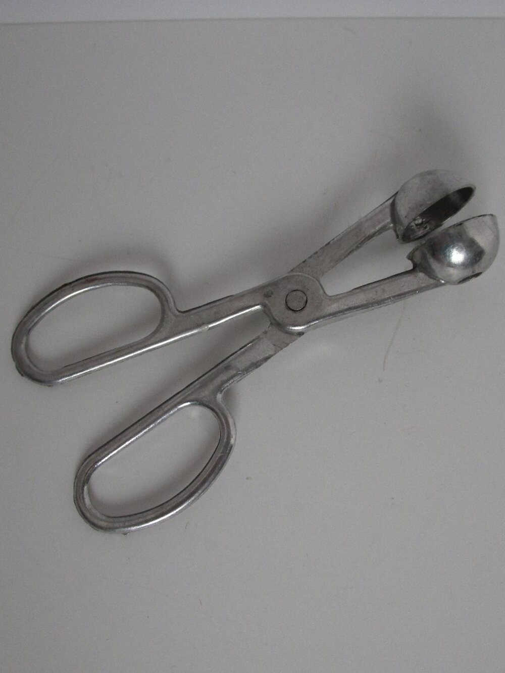 vintage melon baller tongs
